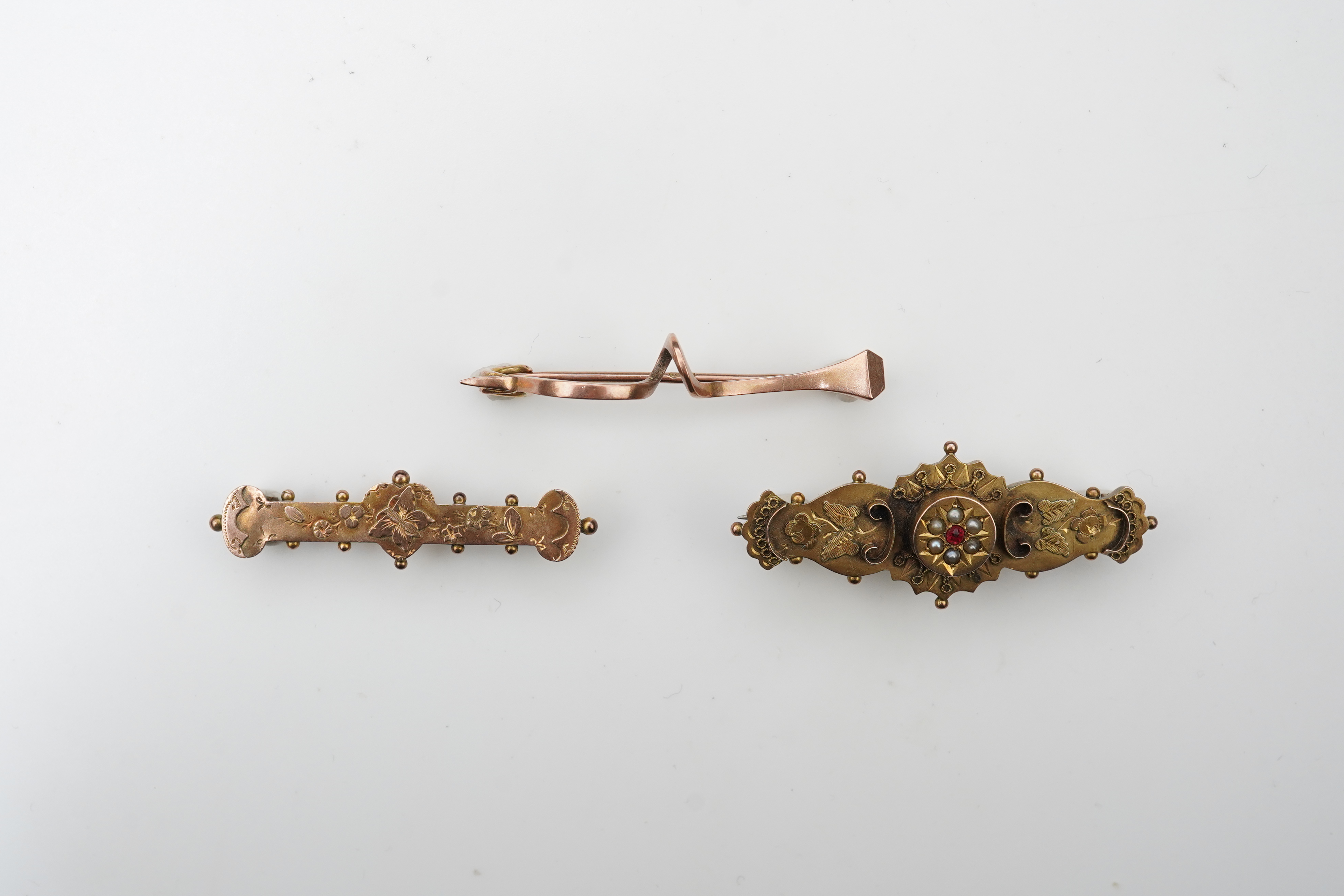 Three bar brooches, late 19th century